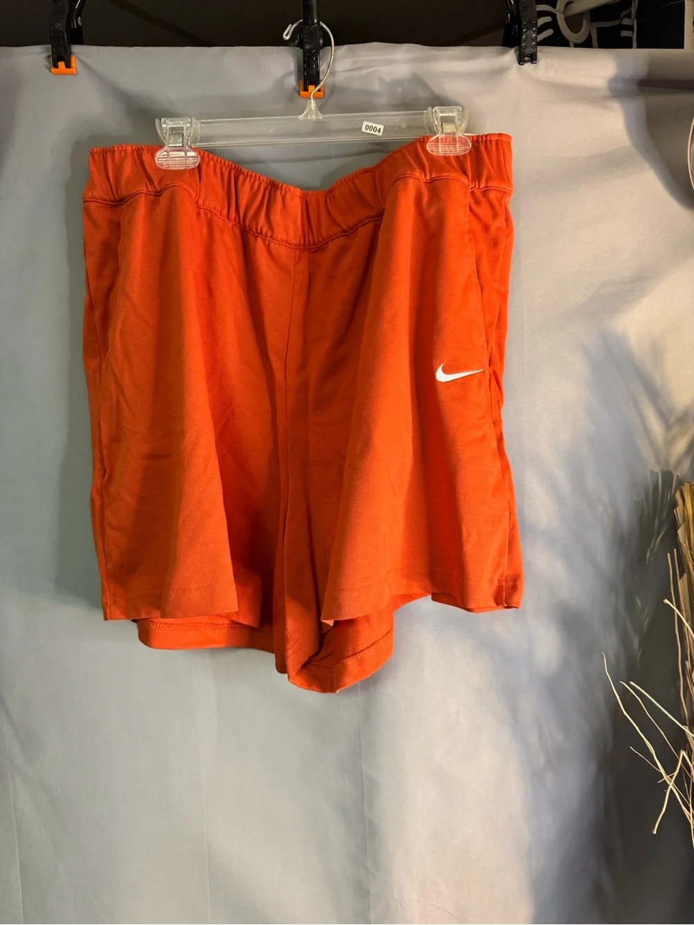 Nike Women’s Bright Orange Athletic Shorts with White Swoosh